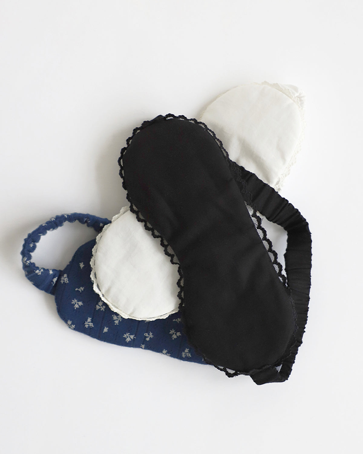 Set of eye mask and headband on a white background